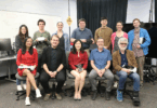 Project leads and researchers from the Center for Advanced Computer-Human Ecosystems (CACHE) gather to celebrate receiving the Georgia Clinical and Translational Science Alliance Presidents' Award of Distinction. Grace Ahn, CACHE founding director (center, front row), holds the award on her lap. (Photos/Sarah E. Freeman)